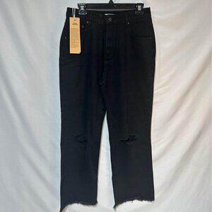 Woman’s wide leg, distressed black jeans. New with tags. Size 10.